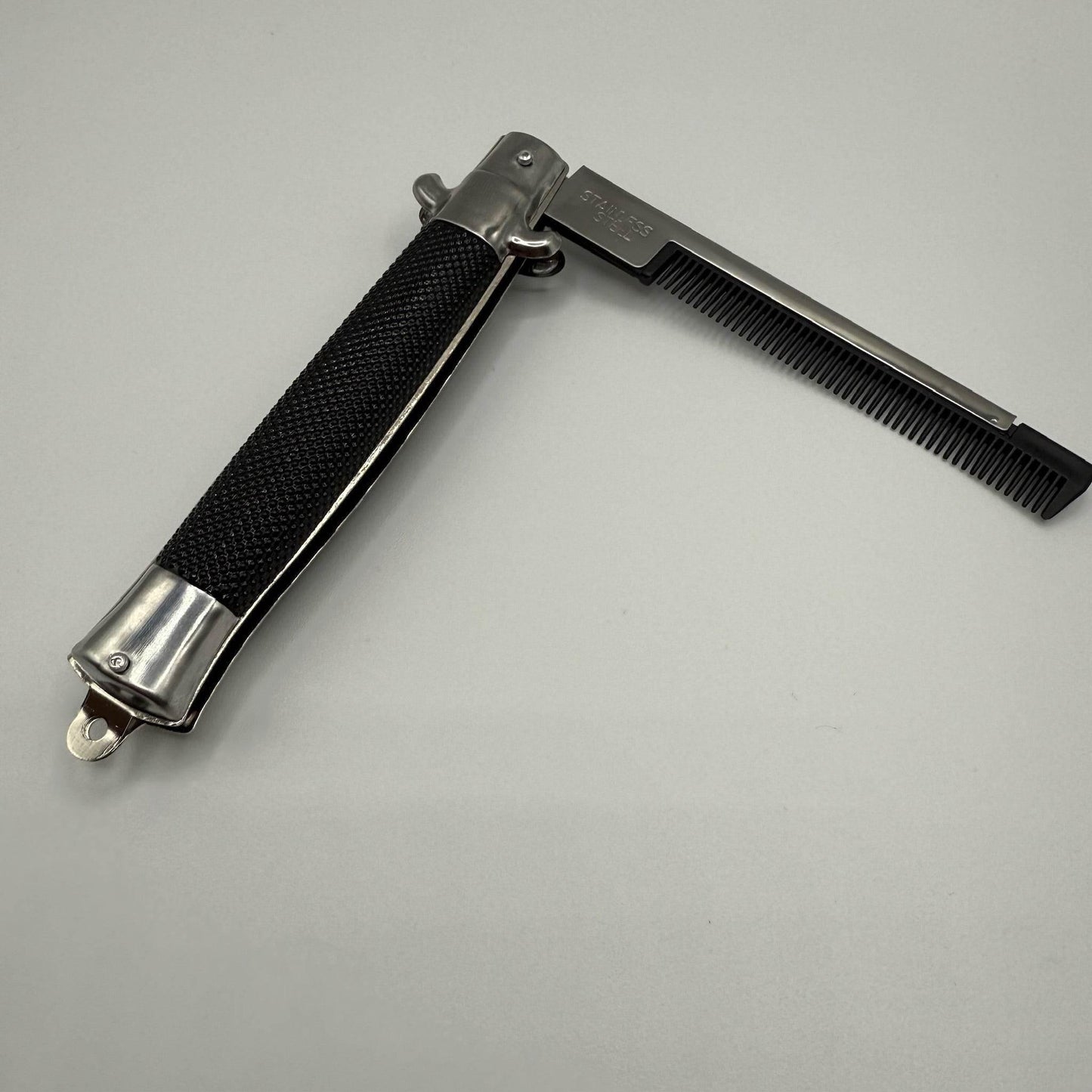 SWITCH BLADE COMB - - The Puntique