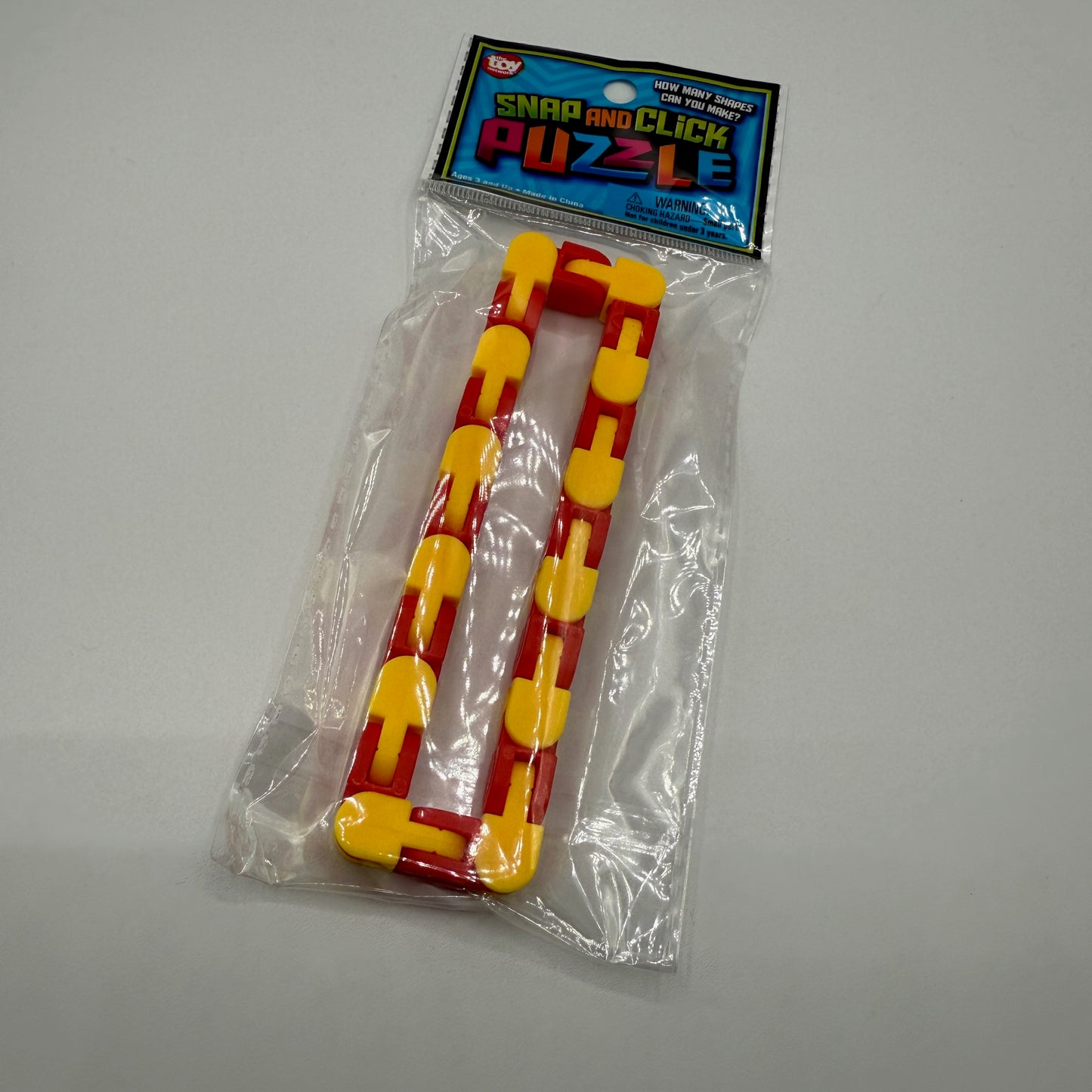 10.75" SNAP AND CLICK PUZZLE - - The Puntique