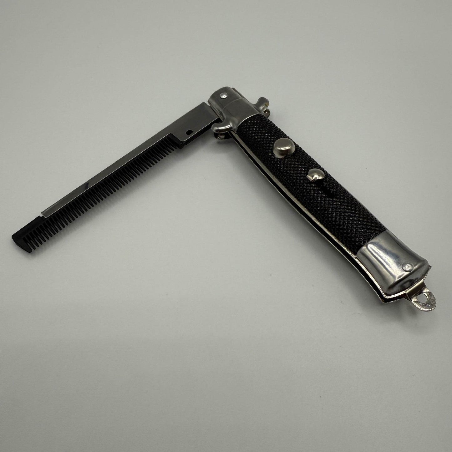 SWITCH BLADE COMB - - The Puntique