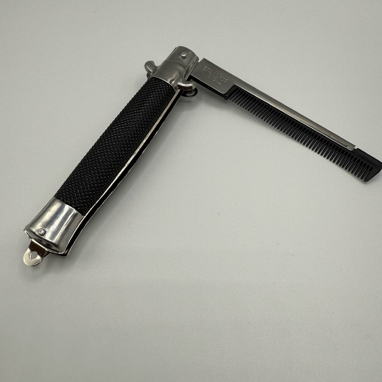SWITCH BLADE COMB - - The Puntique