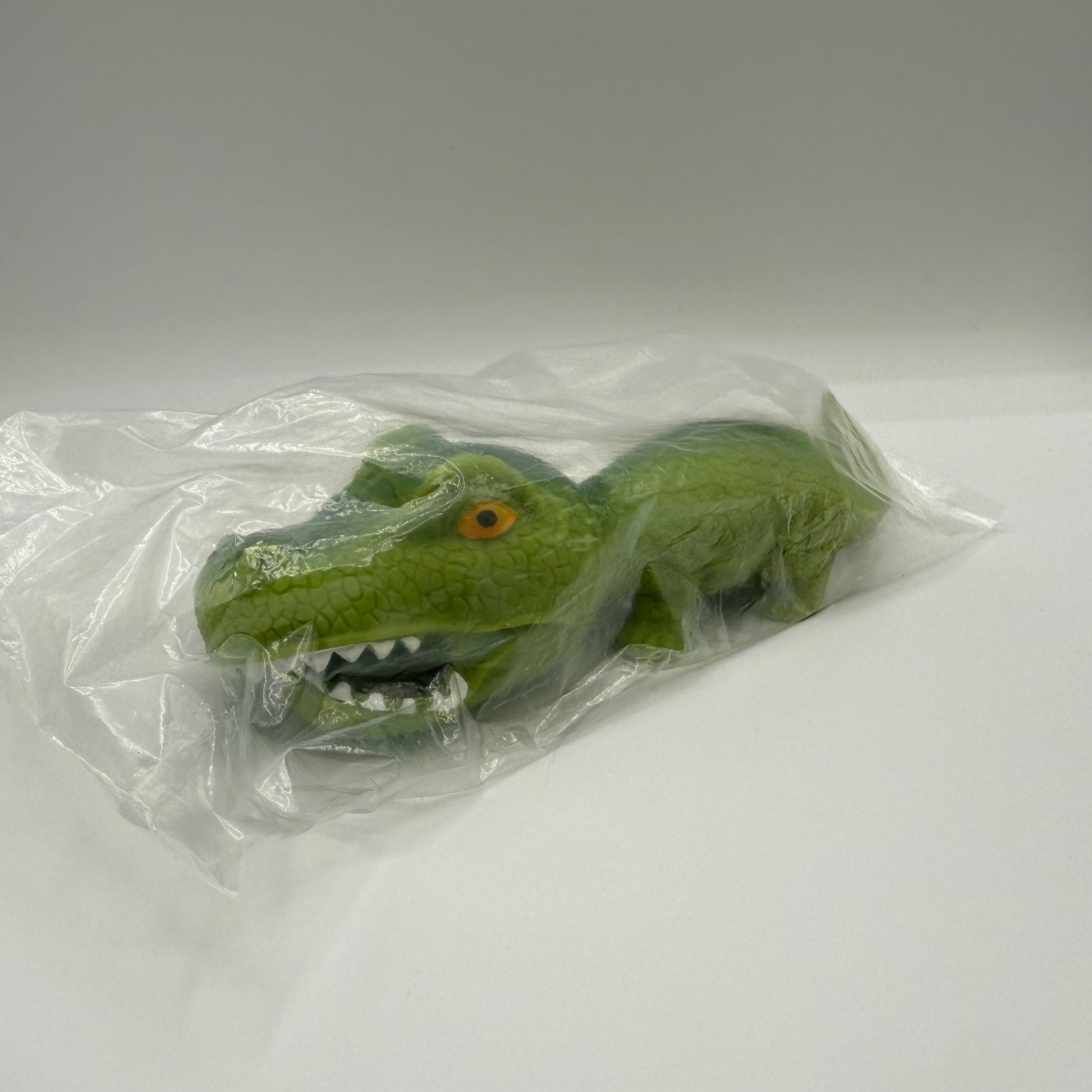 7.5" STRETCHY SAND DINOSAUR - - The Puntique