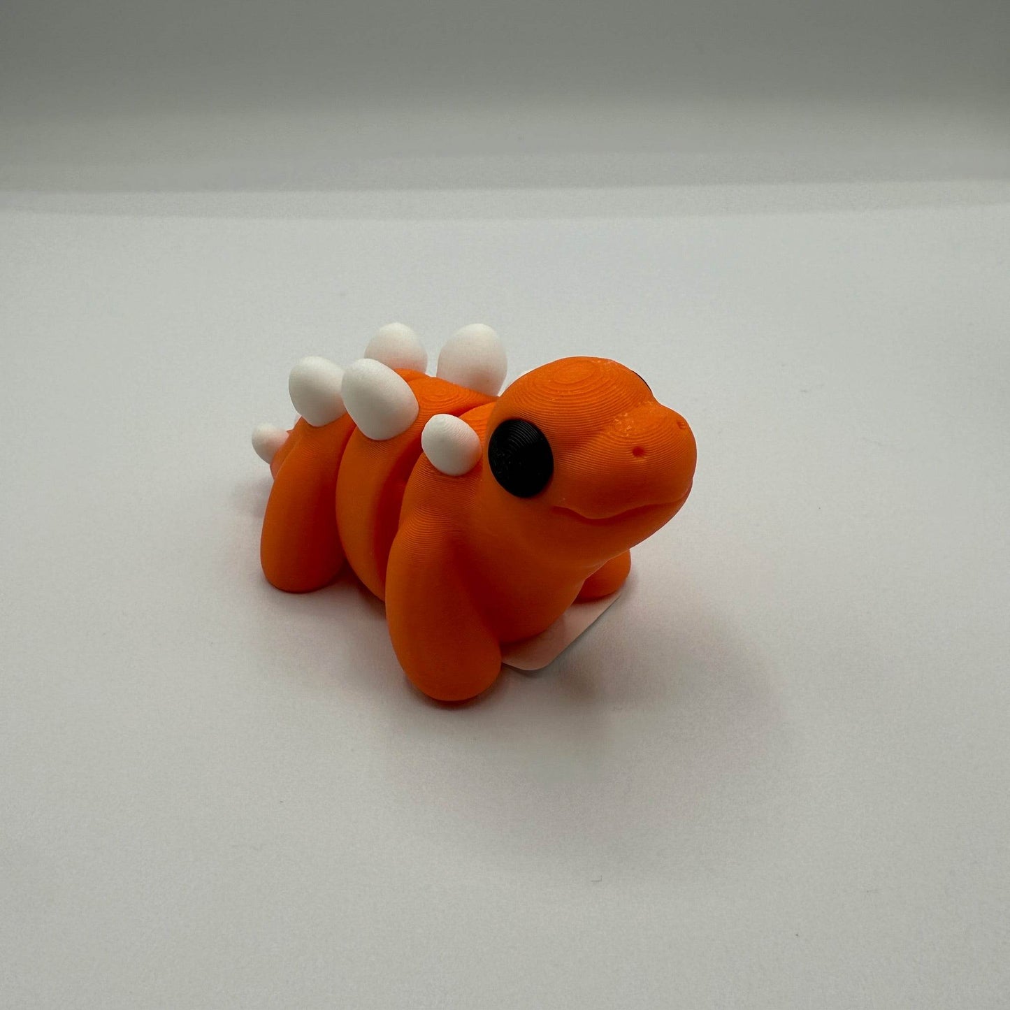 Medium 3D Figures POS - Orange Stegosaurus - The Puntique